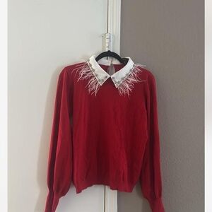 Elegant Red Sweater with Feathered Collar